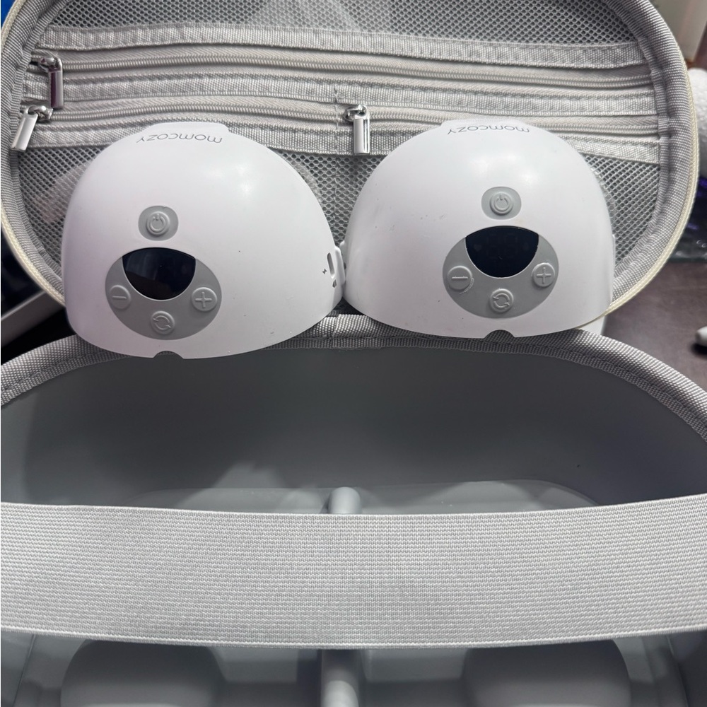 Momcozy Gray and White breast pumps